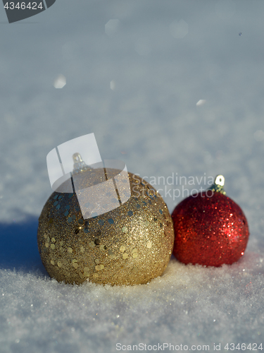 Image of christmas balls decoration in snow