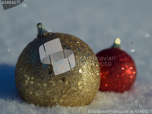 Image of christmas balls decoration in snow