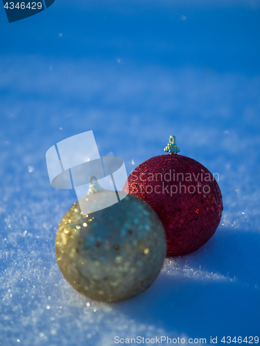 Image of christmas balls decoration in snow