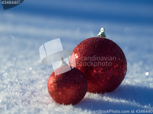 Image of christmas balls decoration in snow