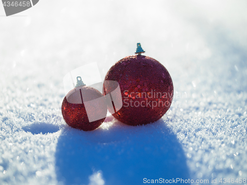 Image of christmas balls decoration in snow