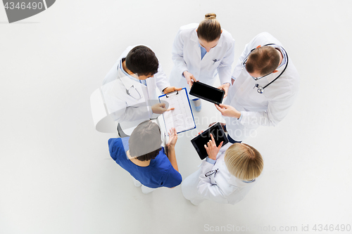 Image of doctors with cardiogram and and tablet pc