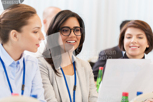 Image of businesswomen at international business conference