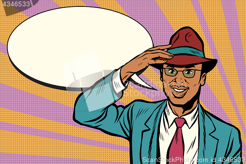 Image of Retro African businessman takes off his hat