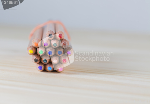 Image of Bundle of Pencils on a Wooden Table