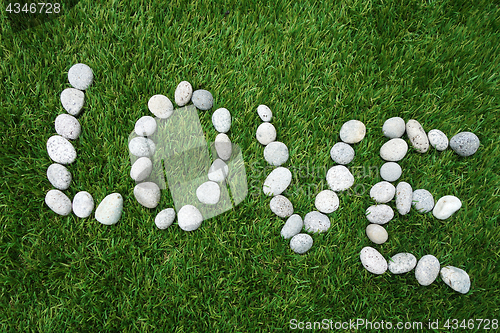 Image of Word love made of pebble stones