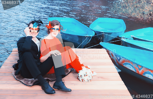 Image of Happy Couple In Masquerade Masks