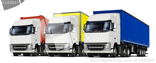 Image of three trucks with various trailers