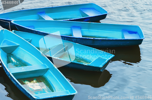 Image of Blue Recreation Boats On The Water