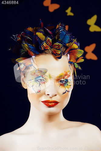 Image of woman with summer creative make up like fairy butterfly closeup bright colored