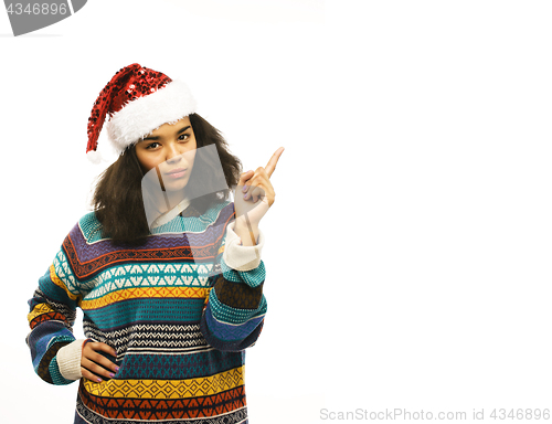 Image of young pretty african american girl in red christmas hat isolated