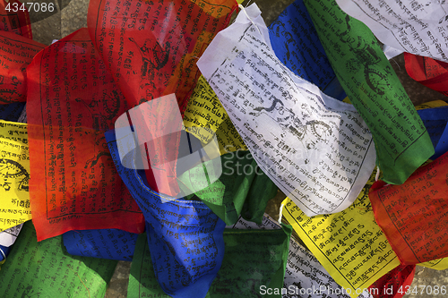 Image of Buddhist colorful prayer flags with printed mantras