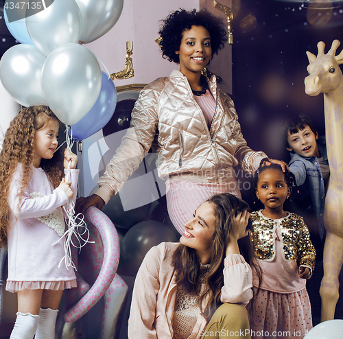 Image of Lifestyle and people concept: young pretty diversity nations woman with different age children celebrating on birth day party together happy smiling, making selfie. African-american, asian and caucasi