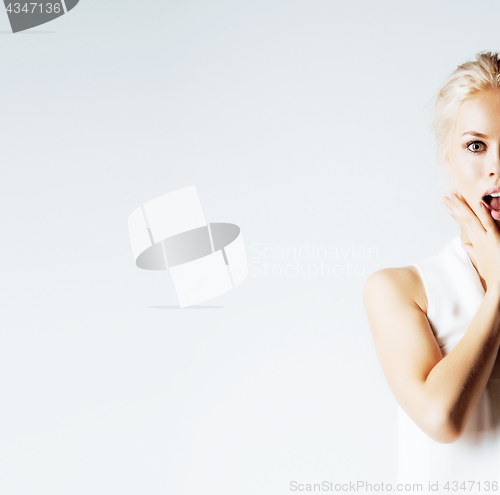 Image of young pretty teenage hipster girl posing emotional happy smiling on white background, lifestyle people concept 