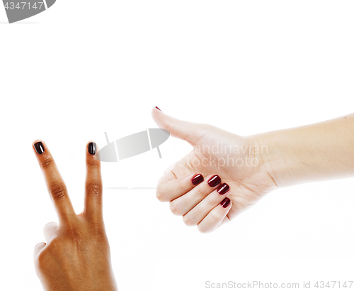 Image of two different nathion manicured hands on white isolated