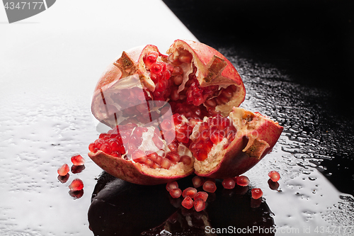 Image of Pomegranate On A Glass Background