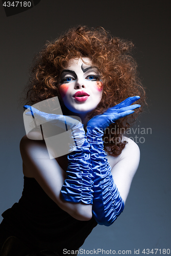 Image of woman mime with theatrical makeup