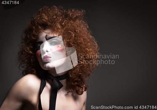 Image of woman mime with theatrical makeup