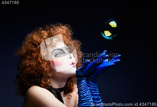 Image of Woman mime with soap bubbles.