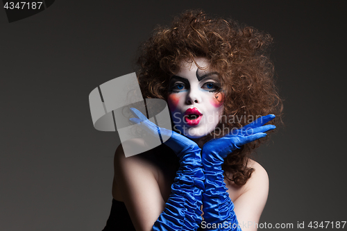 Image of woman mime with theatrical makeup