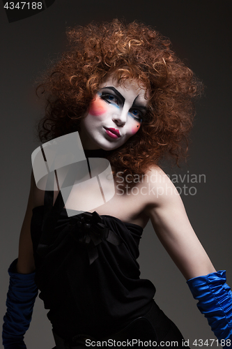 Image of woman mime with theatrical makeup