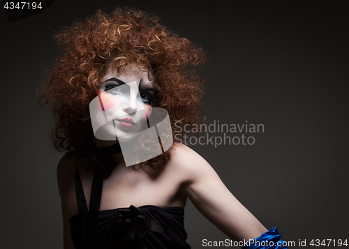 Image of woman mime with theatrical makeup