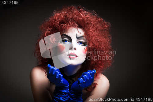 Image of woman mime with theatrical makeup