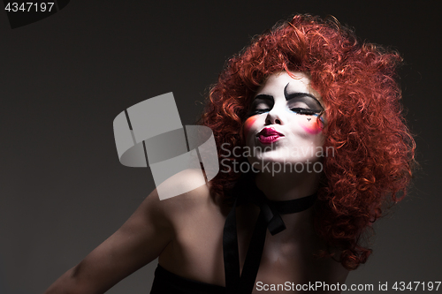 Image of woman mime with theatrical makeup