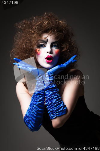 Image of woman mime with theatrical makeup