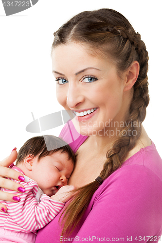 Image of Mother holding newborn baby in arms