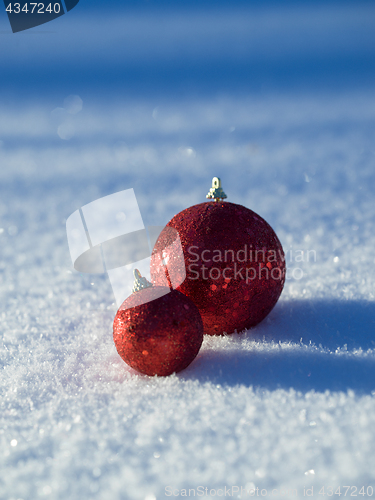 Image of christmas balls decoration in snow