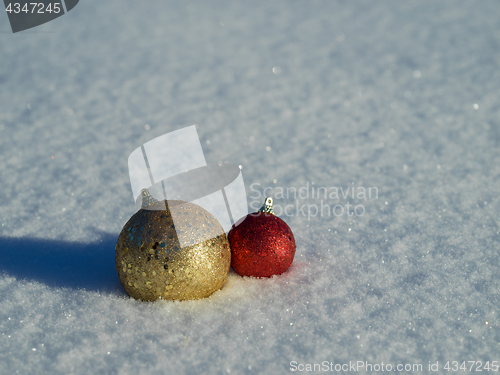 Image of christmas balls decoration in snow