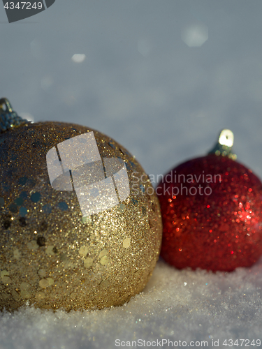 Image of christmas balls decoration in snow