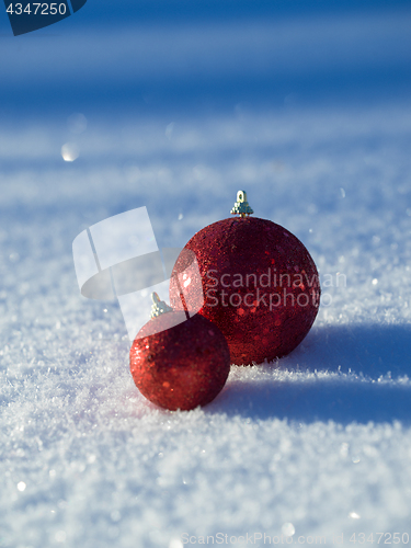 Image of christmas balls decoration in snow