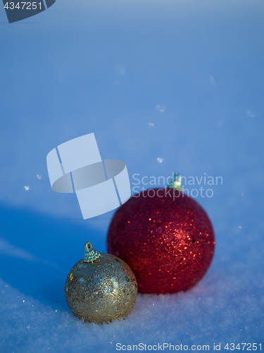 Image of christmas balls decoration in snow