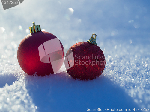 Image of christmas balls decoration in snow