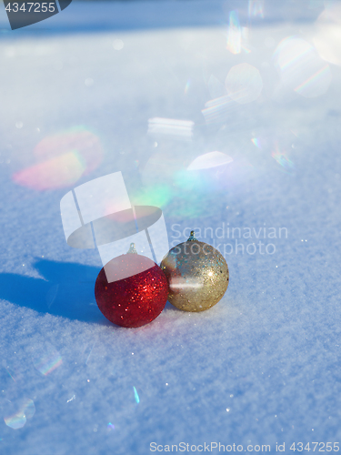 Image of christmas balls decoration in snow