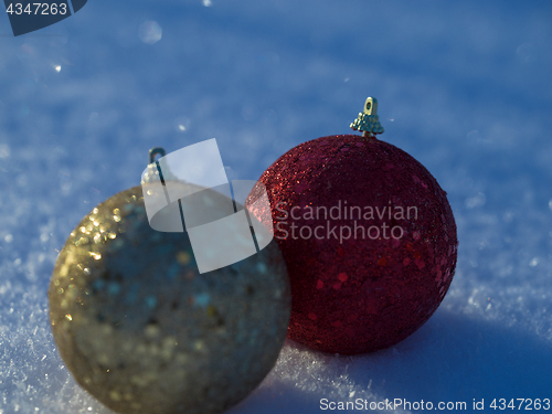 Image of christmas balls decoration in snow