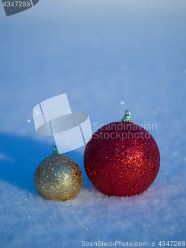 Image of christmas balls decoration in snow