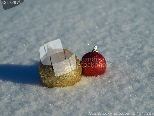 Image of christmas balls decoration in snow