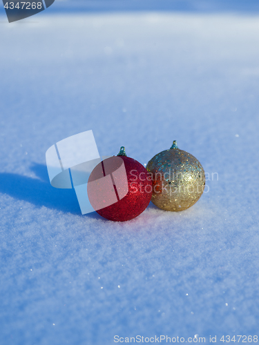 Image of christmas balls decoration in snow