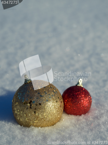 Image of christmas balls decoration in snow