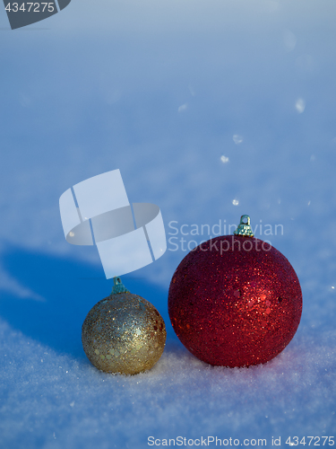 Image of christmas balls decoration in snow