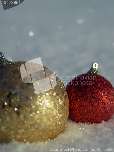 Image of christmas balls decoration in snow