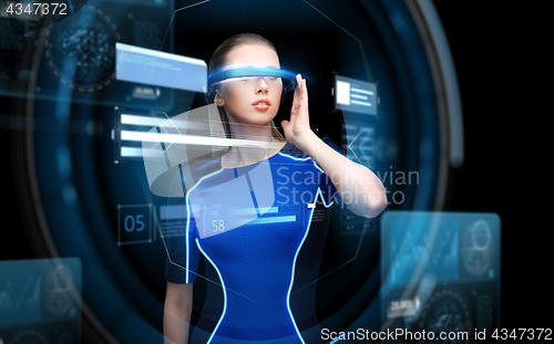 Image of woman in virtual reality 3d glasses with charts