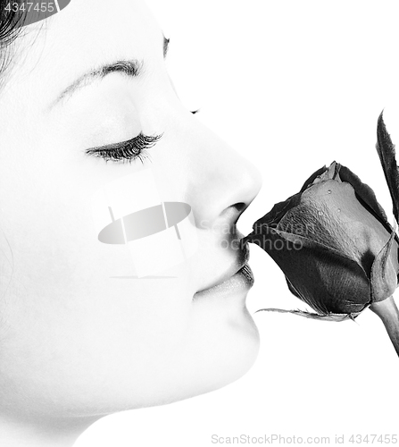 Image of Girl Smelling A Rose From Her Boyfriend