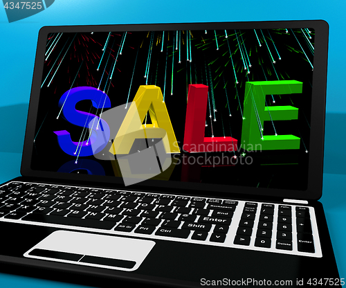 Image of Sale Message On Laptop Shows Online Discounts