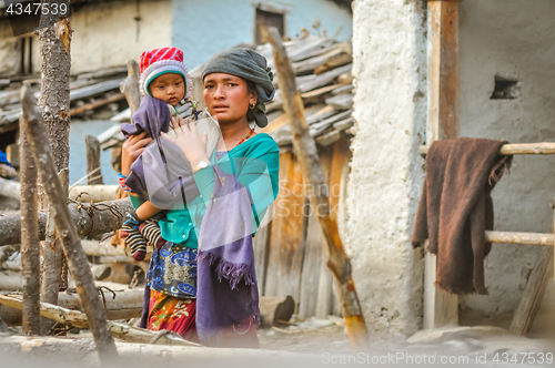 Image of Posing woman with child in Nepal