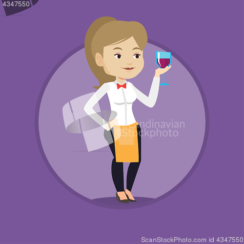 Image of Bartender holding a glass of wine in hand.