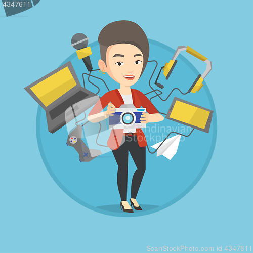 Image of Young woman surrounded with her gadgets.